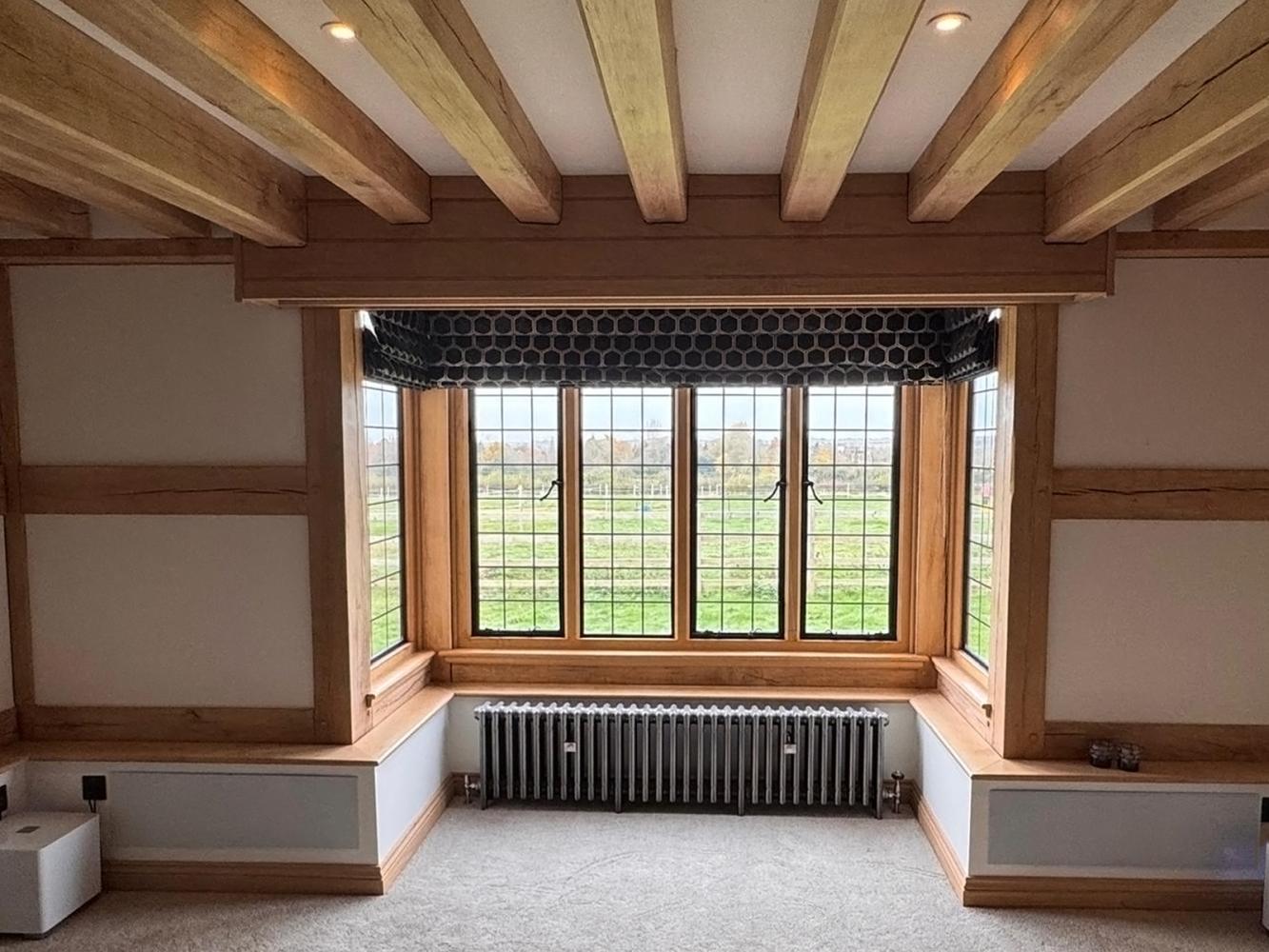 Bay window Projector screen in oak beamed room