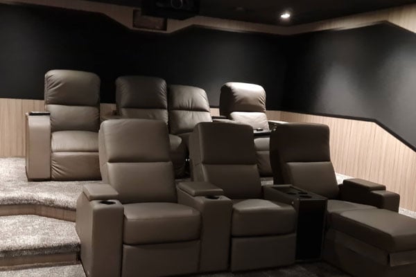 Leather home cinema seats in luxury dedicated cinema room
