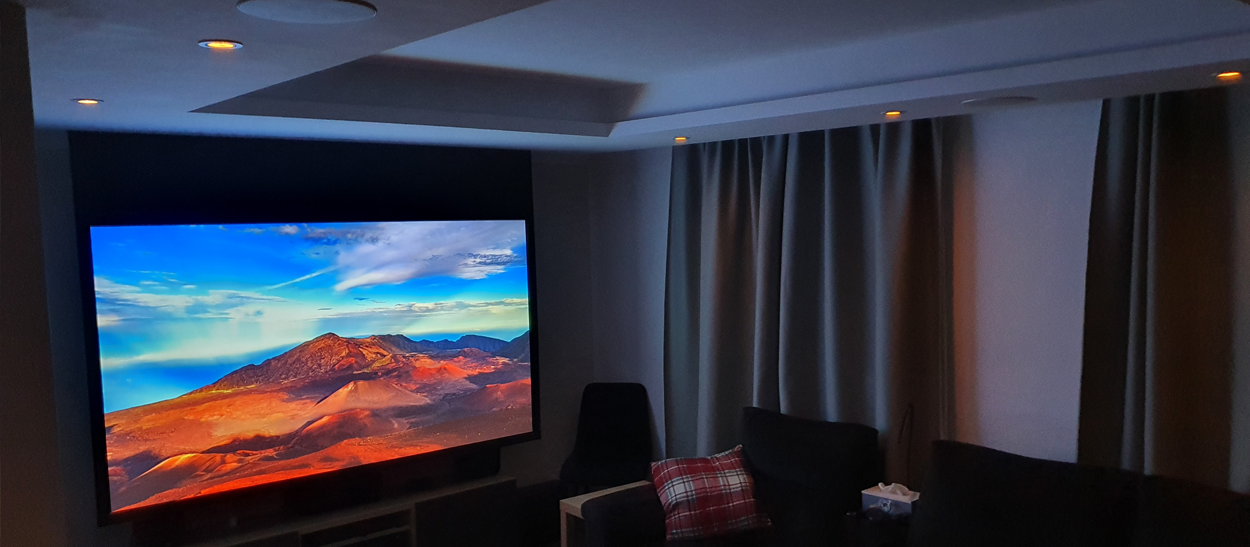 dark living room with projector screen