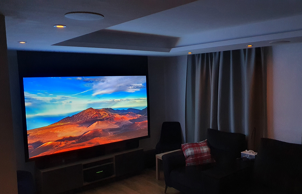 dark living room with projector screen